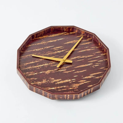 Mokuroku 12-sided Japanese wooden wall clock made of cherry wood with minimalist design and brass hands, handcrafted in Japan.