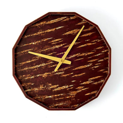 Mokuroku 12-sided Japanese wooden wall clock made of cherry wood with minimalist design and brass hands, handcrafted in Japan.