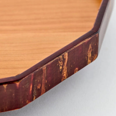 Mokuroku 12-sided Japanese wooden wall clock made of cherry wood with minimalist design and brass hands, handcrafted in Japan.