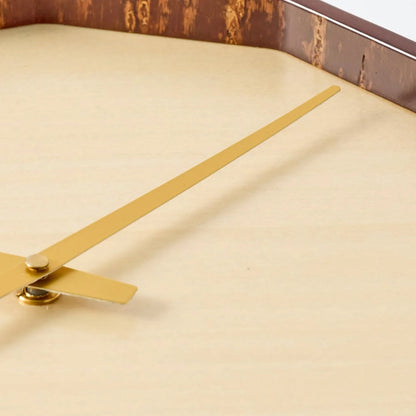Mokuroku 12-sided Japanese wooden wall clock made of cherry wood with minimalist design and brass hands, handcrafted in Japan.