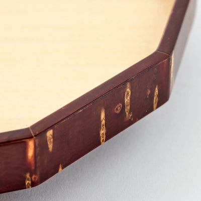 Mokuroku 12-sided Japanese wooden wall clock made of cherry wood with minimalist design and brass hands, handcrafted in Japan.