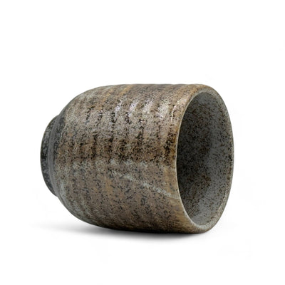 Handcrafted Mino-yaki Yunomi Japanese teacup with traditional glaze, perfect for daily tea rituals.