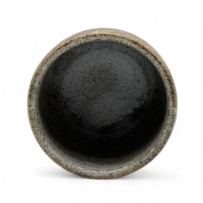 Handcrafted Mino-yaki Yunomi Japanese teacup with traditional glaze, perfect for daily tea rituals.