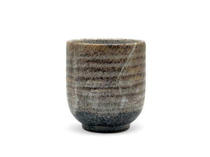 Handcrafted Mino-yaki Yunomi Japanese teacup with traditional glaze, perfect for daily tea rituals.