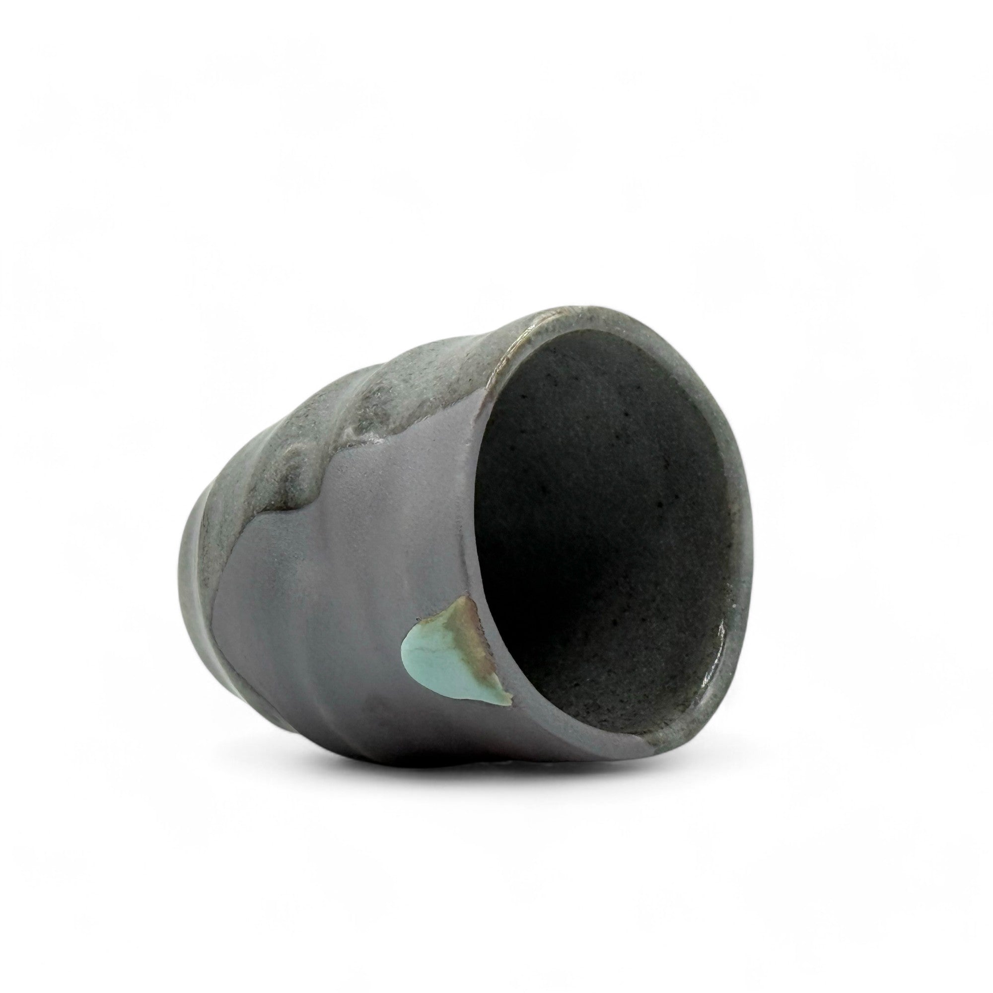Handcrafted Mino-yaki Yunomi Japanese teacup with traditional glaze, perfect for daily tea rituals.