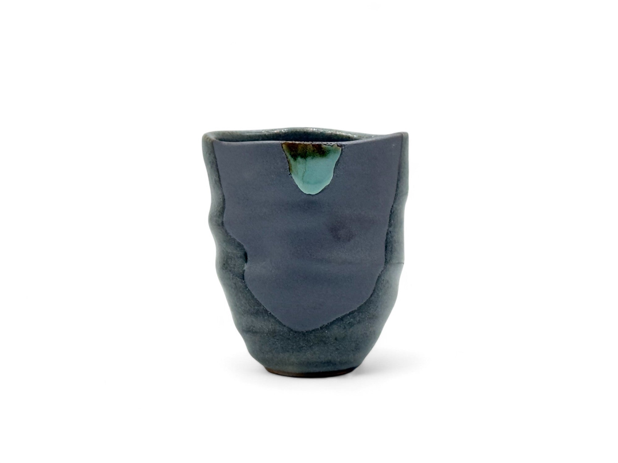 Handcrafted Mino-yaki Yunomi Japanese teacup with traditional glaze, perfect for daily tea rituals.