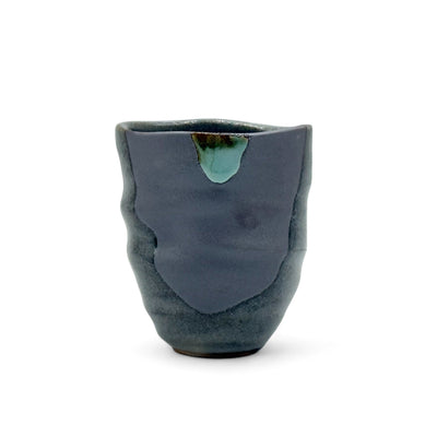 Handcrafted Mino-yaki Yunomi Japanese teacup with traditional glaze, perfect for daily tea rituals.