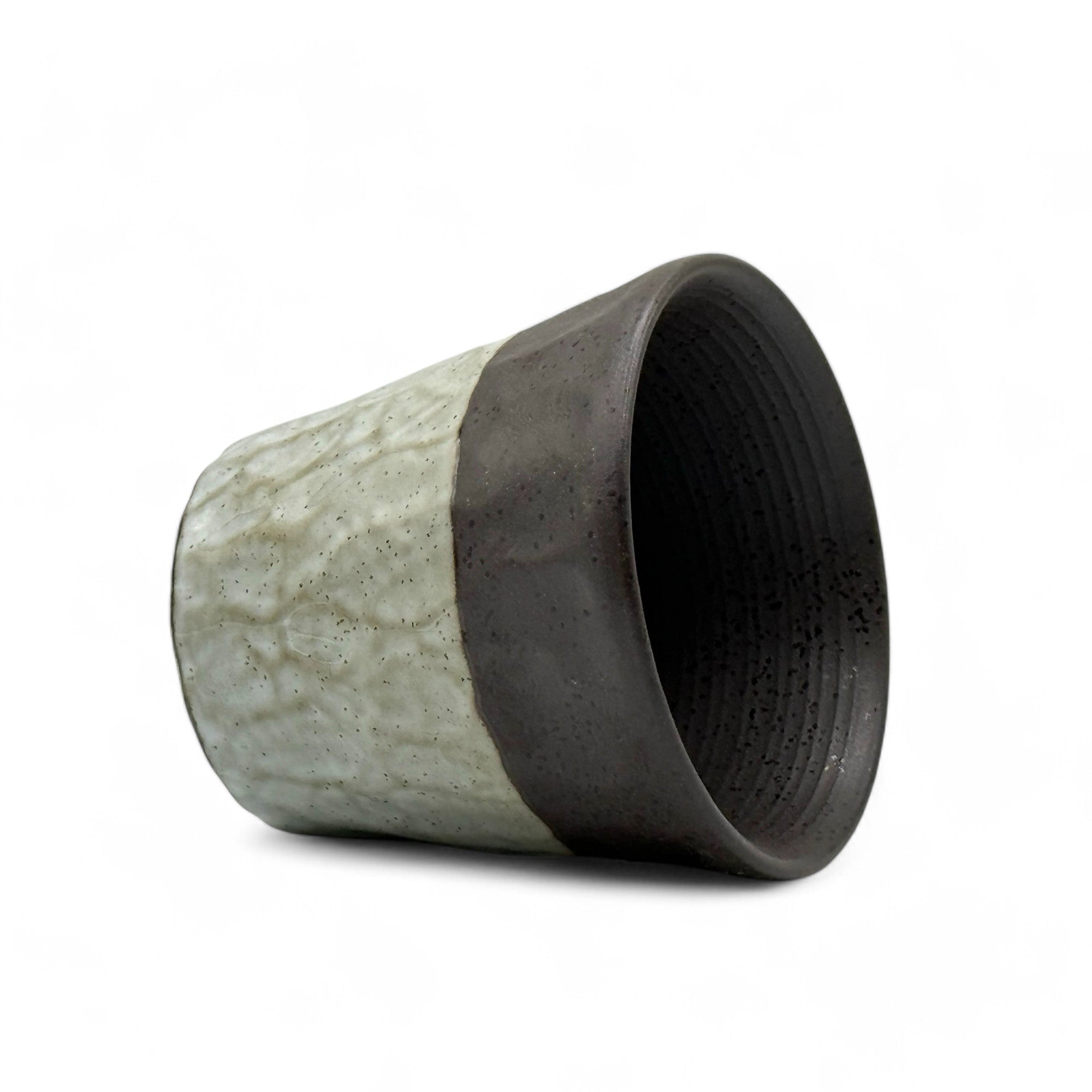 Handcrafted Mino-yaki Yunomi Japanese teacup with traditional glaze, perfect for daily tea rituals.