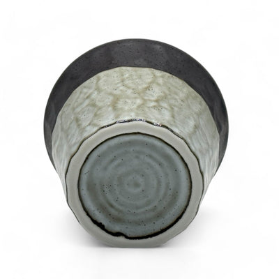 Handcrafted Mino-yaki Yunomi Japanese teacup with traditional glaze, perfect for daily tea rituals.