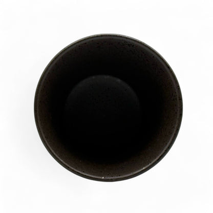 Handcrafted Mino-yaki Yunomi Japanese teacup with traditional glaze, perfect for daily tea rituals.