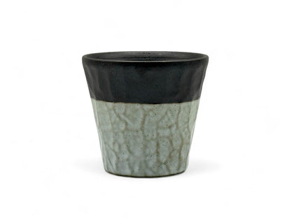 Handcrafted Mino-yaki Yunomi Japanese teacup with traditional glaze, perfect for daily tea rituals.