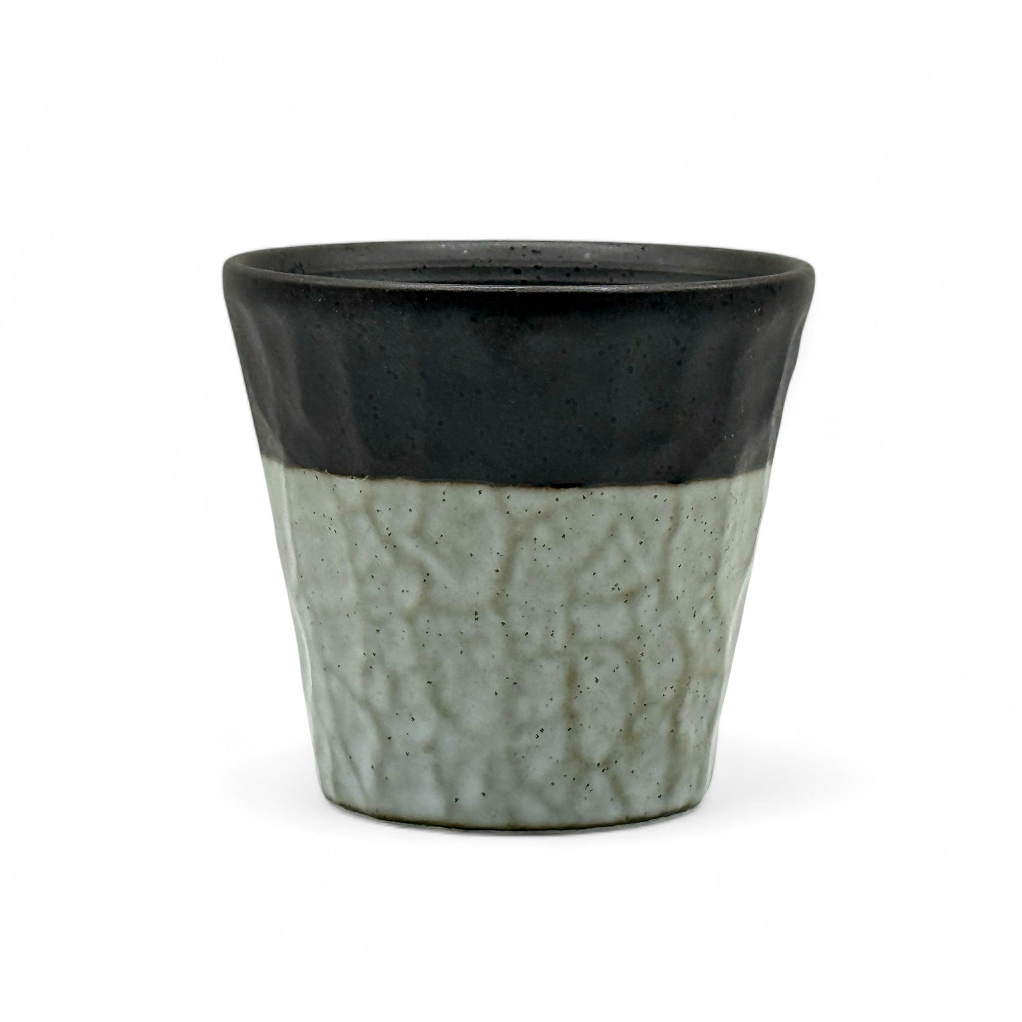 Handcrafted Mino-yaki Yunomi Japanese teacup with traditional glaze, perfect for daily tea rituals.