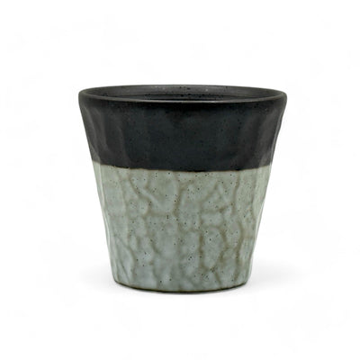 Handcrafted Mino-yaki Yunomi Japanese teacup with traditional glaze, perfect for daily tea rituals.