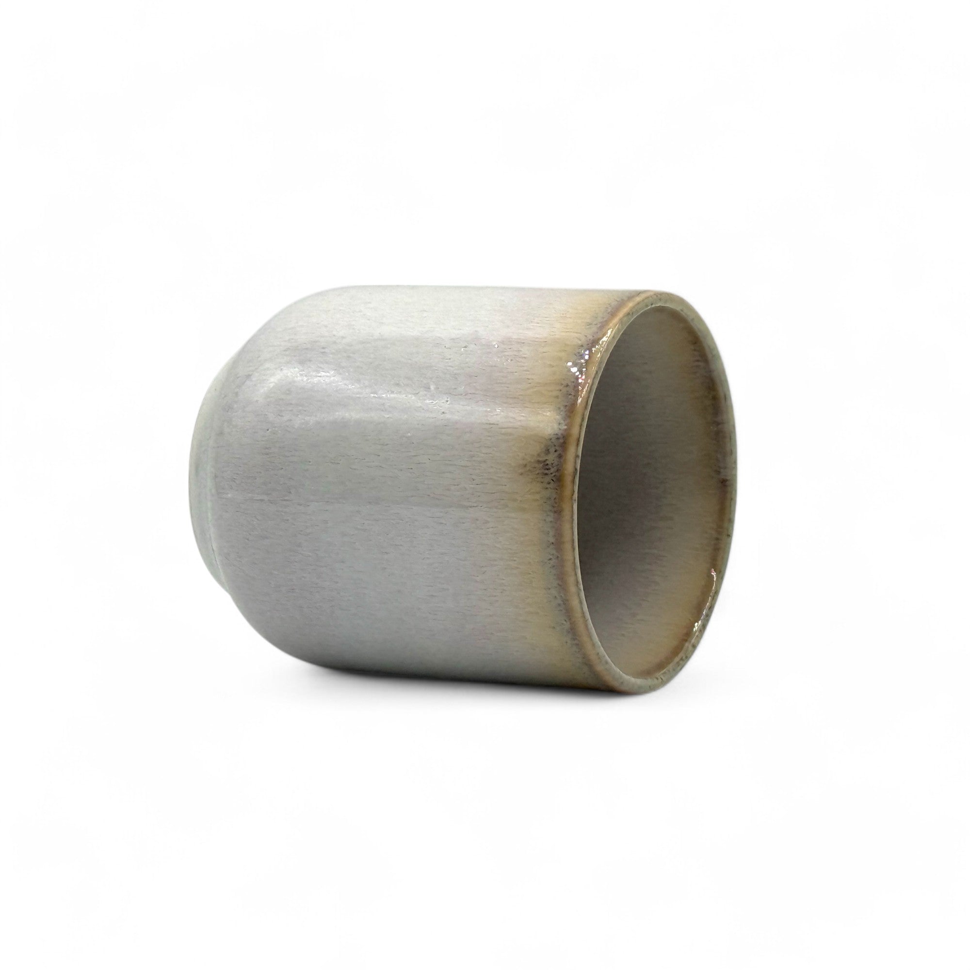 Handcrafted Mino-yaki Yunomi Japanese teacup with traditional glaze, perfect for daily tea rituals.