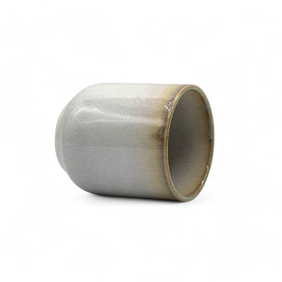 Handcrafted Mino-yaki Yunomi Japanese teacup with traditional glaze, perfect for daily tea rituals.