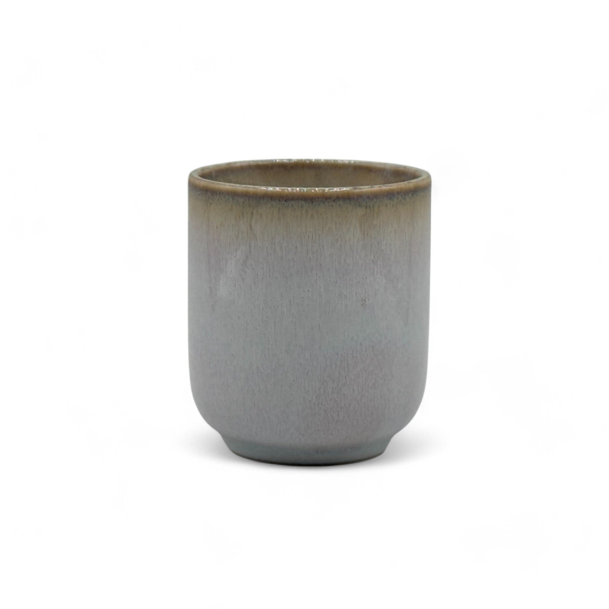 Handcrafted Mino-yaki Yunomi Japanese teacup with traditional glaze, perfect for daily tea rituals.