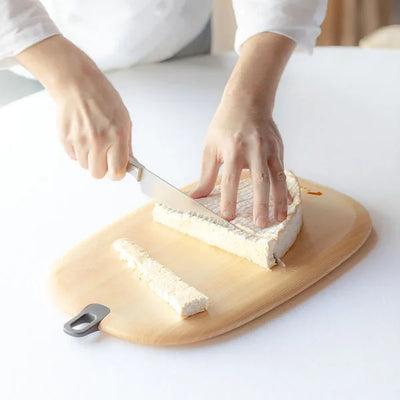 Japanese round wooden cutting board durable kitchen chopping board for food prep and serving.