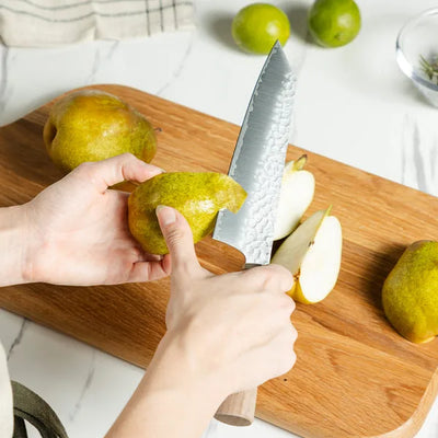 Premium 7-inch kiritsuke knife, Japanese VG10 steel chef knife for precision slicing and multipurpose cooking.