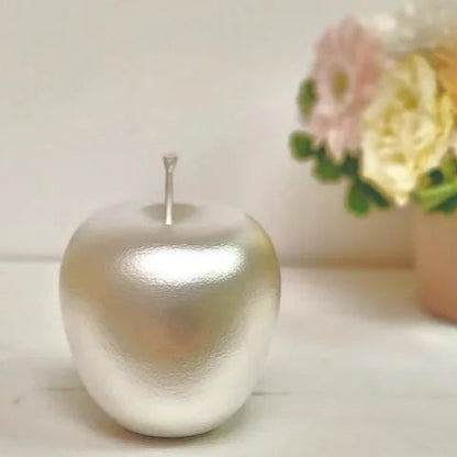Pure silver Japanese apple bobblehead figurine – handcrafted artisan gift, collectible decor with elegant metallic shine.