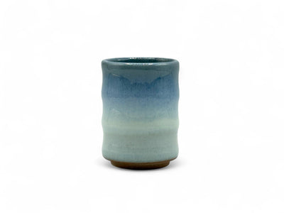 Handcrafted Mino-yaki Yunomi Japanese teacup with traditional glaze, perfect for daily tea rituals.
