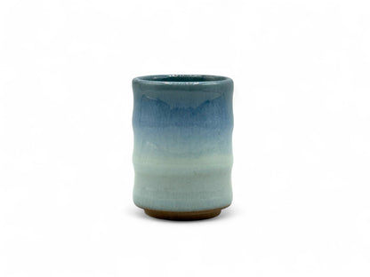 Handcrafted Mino-yaki Yunomi Japanese teacup with traditional glaze, perfect for daily tea rituals.