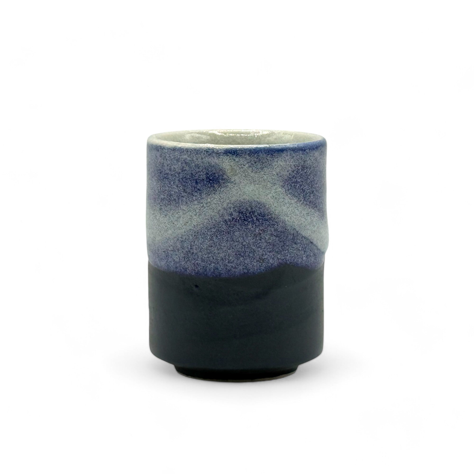 Handcrafted Mino-yaki Yunomi Japanese teacup with traditional glaze, perfect for daily tea rituals.