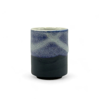 Handcrafted Mino-yaki Yunomi Japanese teacup with traditional glaze, perfect for daily tea rituals.