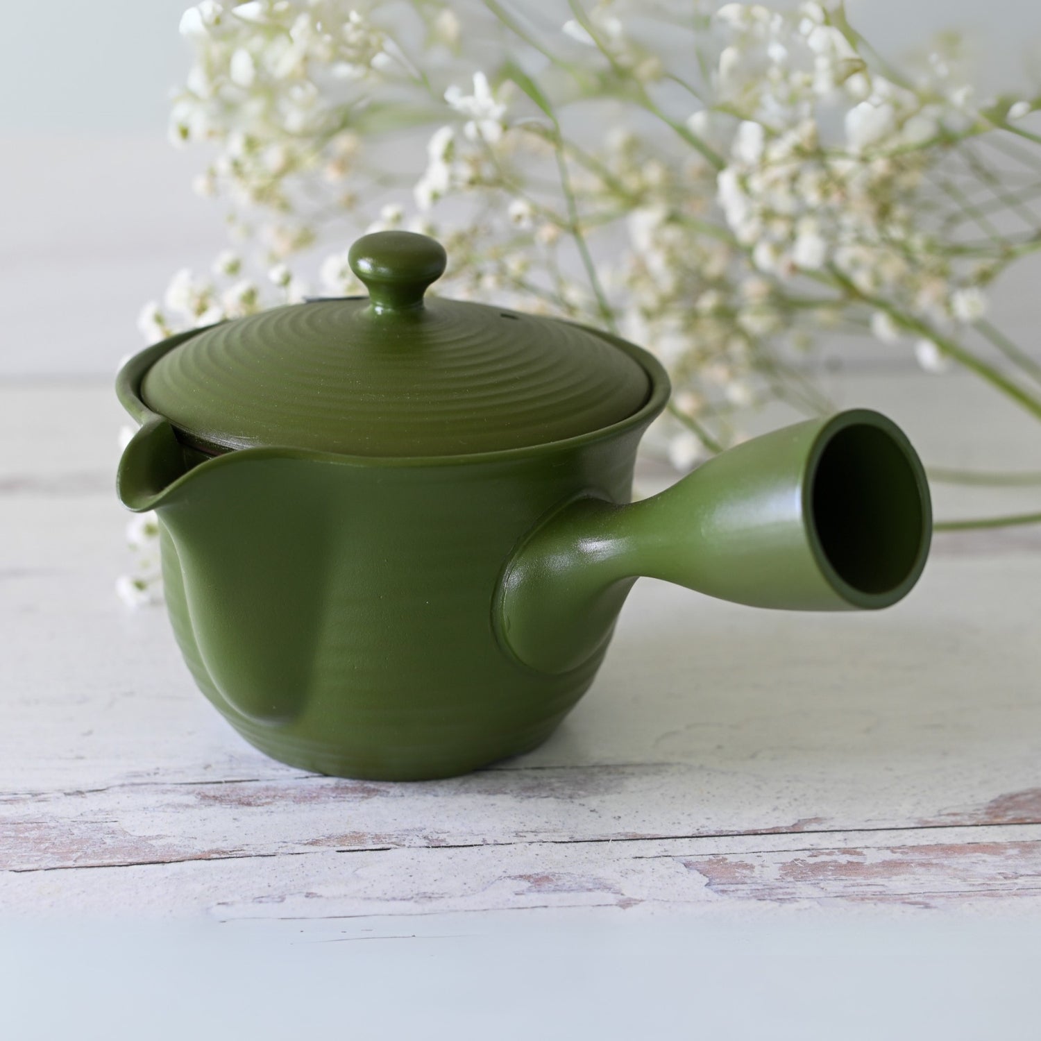 Ryokufū Green Tokoname-Yaki Kyusu, handcrafted Japanese teapot perfect for brewing green tea.
