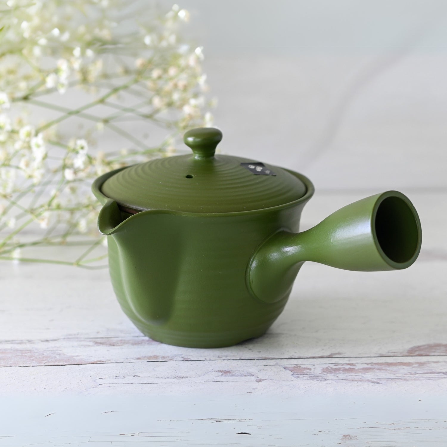 Ryokufū Green Tokoname-Yaki Kyusu, handcrafted Japanese teapot perfect for brewing green tea.
