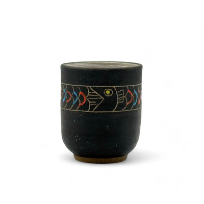 Handcrafted Mino-yaki Yunomi Japanese teacup with traditional glaze, perfect for daily tea rituals.