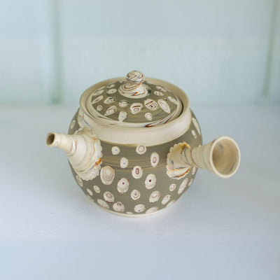 Seijaku Japanese Kyusu tea set with traditional ceramic teapot and cups for authentic green tea brewing.