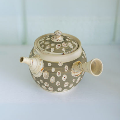 Seijaku Japanese Kyusu tea set with traditional ceramic teapot and cups for authentic green tea brewing.