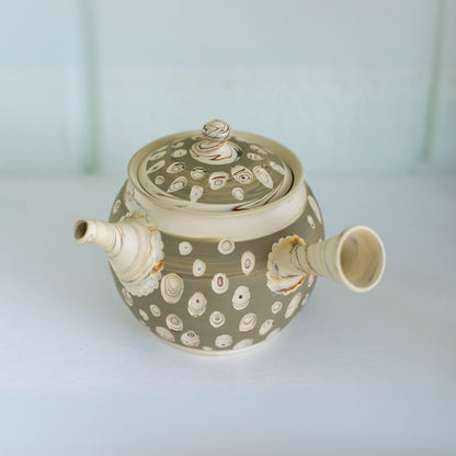 Seijaku Japanese Kyusu tea set with traditional ceramic teapot and cups for authentic green tea brewing.