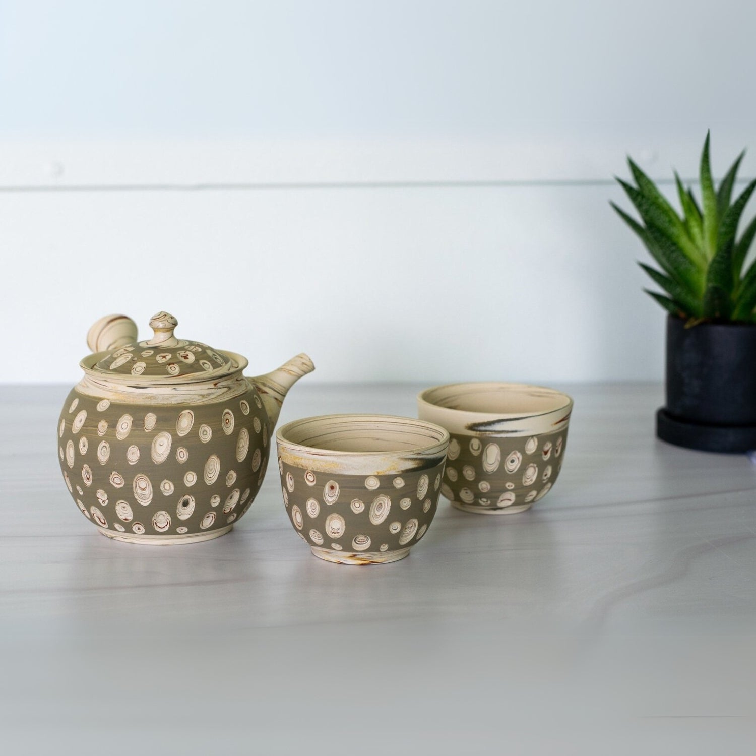Seijaku Japanese Kyusu tea set with traditional ceramic teapot and cups for authentic green tea brewing.