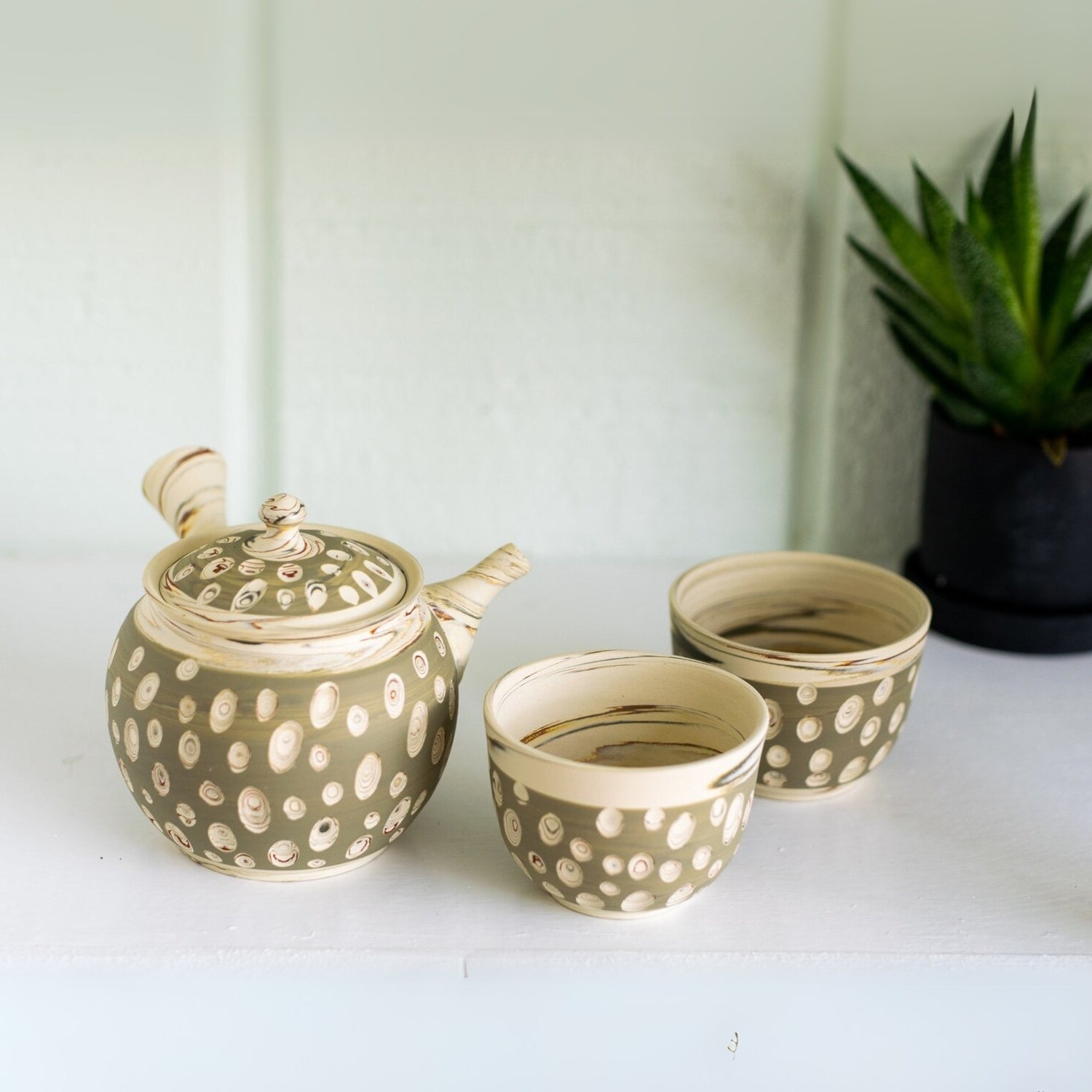 Seijaku Japanese Kyusu tea set with traditional ceramic teapot and cups for authentic green tea brewing.