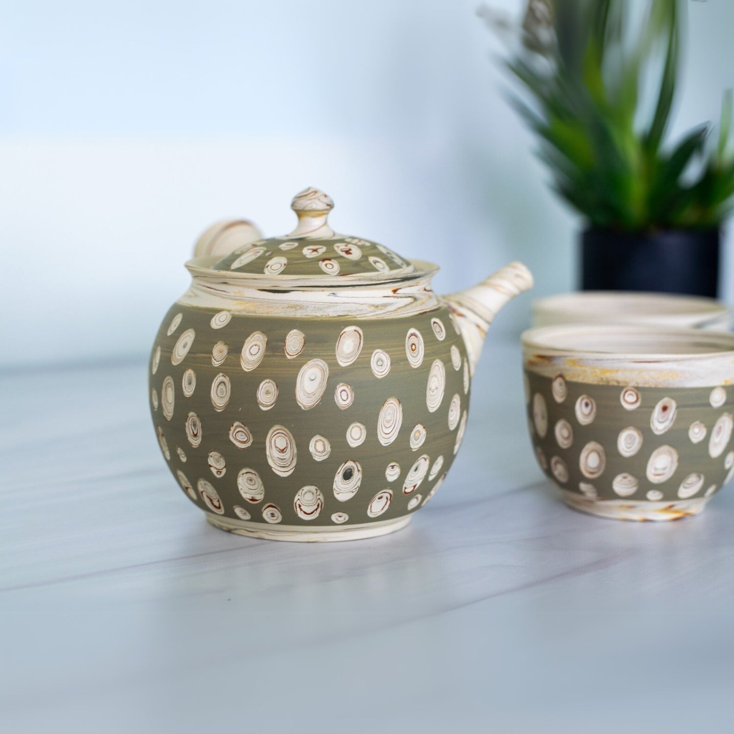 Seijaku Japanese Kyusu tea set with traditional ceramic teapot and cups for authentic green tea brewing.