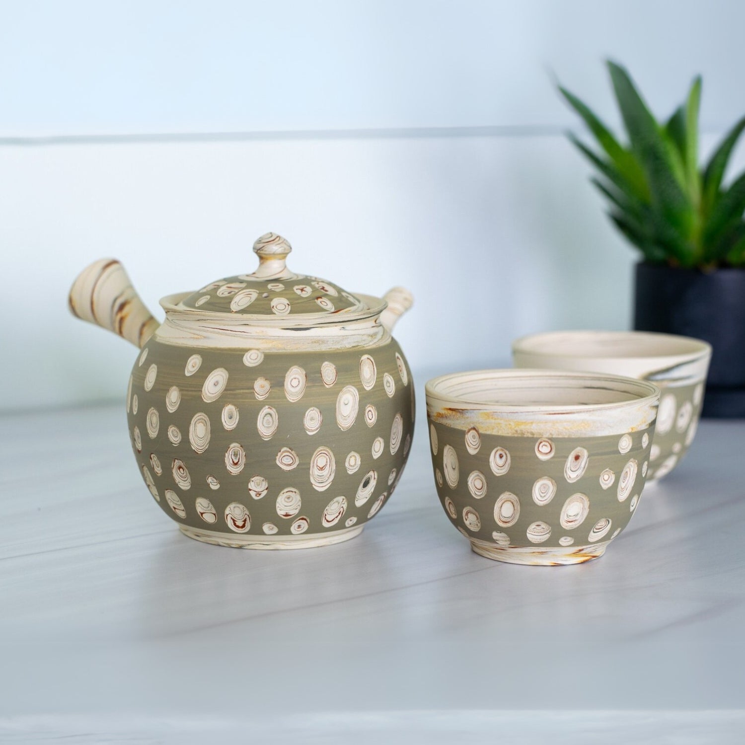 Seijaku Japanese Kyusu tea set with traditional ceramic teapot and cups for authentic green tea brewing.