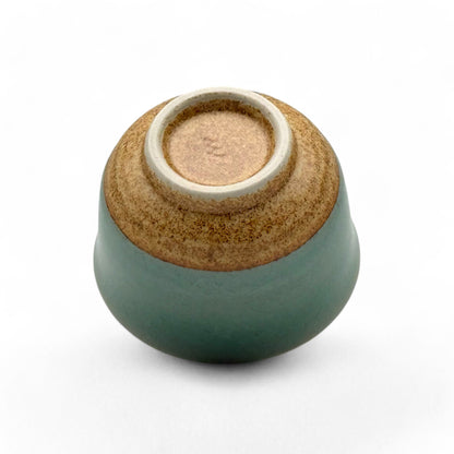 Handcrafted Mino-yaki Yunomi Japanese Sencha teacup with traditional glaze, perfect for daily tea rituals.