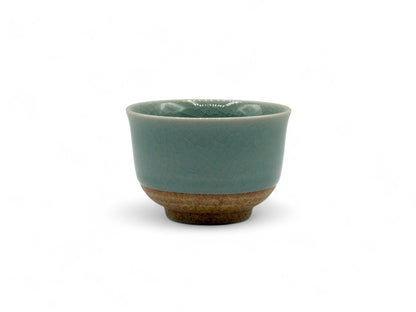 Handcrafted Mino-yaki Yunomi Japanese Sencha teacup with traditional glaze, perfect for daily tea rituals.