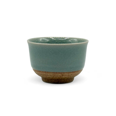 Handcrafted Mino-yaki Yunomi Japanese Sencha teacup with traditional glaze, perfect for daily tea rituals.
