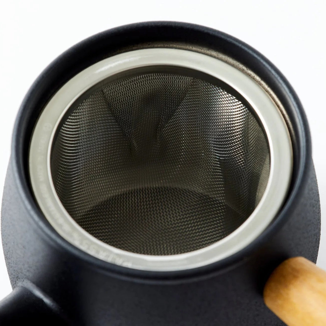 Seikoku black stainless steel teapot with modern Japanese design for elegant tea brewing.