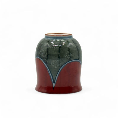 Handcrafted Hasami-yaki Yunomi Japanese teacup with traditional glaze, perfect for daily tea rituals.