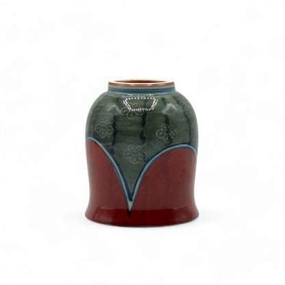 Handcrafted Hasami-yaki Yunomi Japanese teacup with traditional glaze, perfect for daily tea rituals.