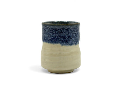 Handcrafted Mino-yaki Yunomi Japanese teacup with traditional glaze, perfect for daily tea rituals.