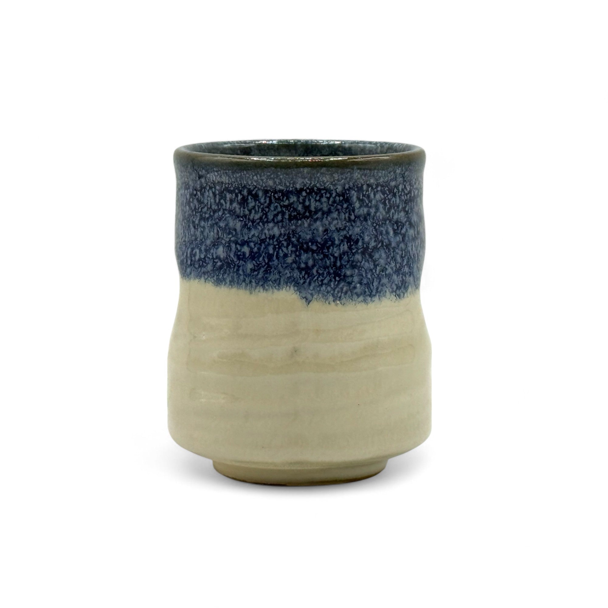 Handcrafted Mino-yaki Yunomi Japanese teacup with traditional glaze, perfect for daily tea rituals.