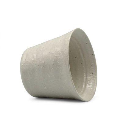 Handcrafted Mino-yaki Yunomi Japanese teacup with traditional glaze, perfect for daily tea rituals.