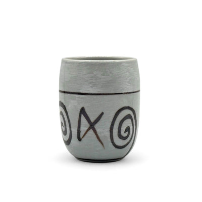 Handcrafted Mino-yaki Yunomi Japanese teacup with traditional glaze, perfect for daily tea rituals.