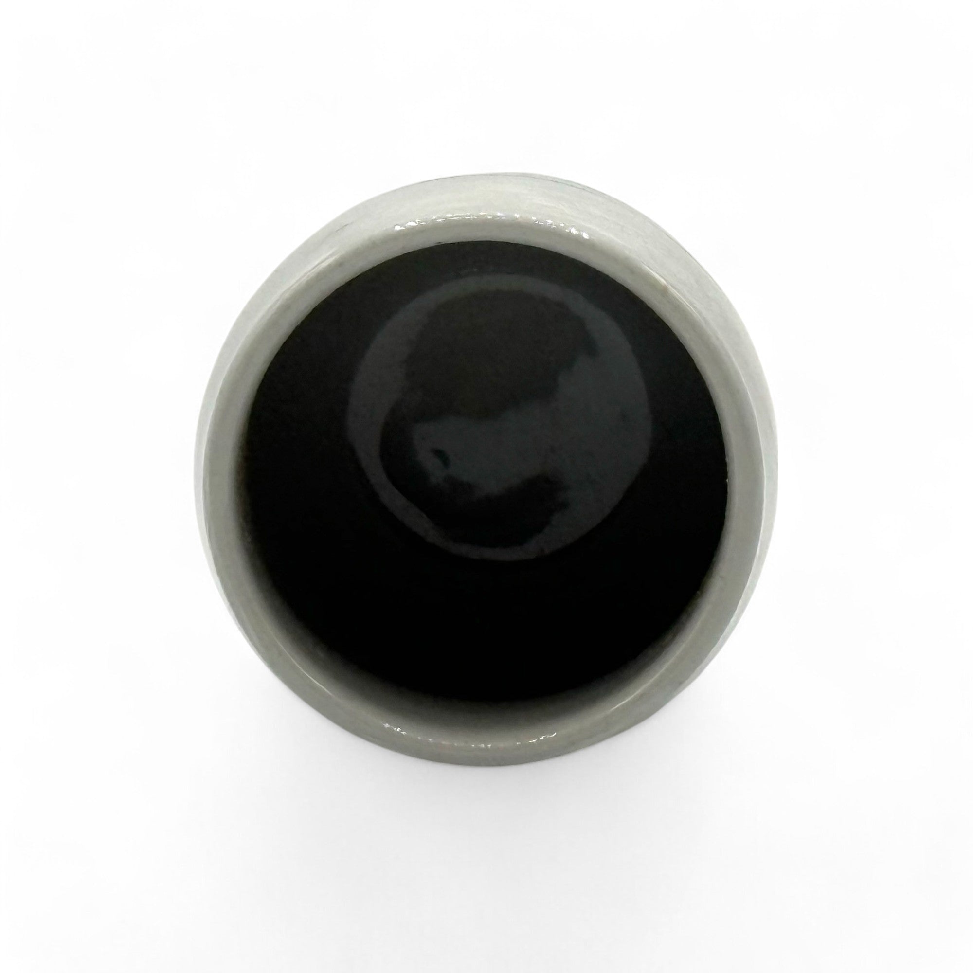 Handcrafted Mino-yaki Yunomi Japanese teacup with traditional glaze, perfect for daily tea rituals.
