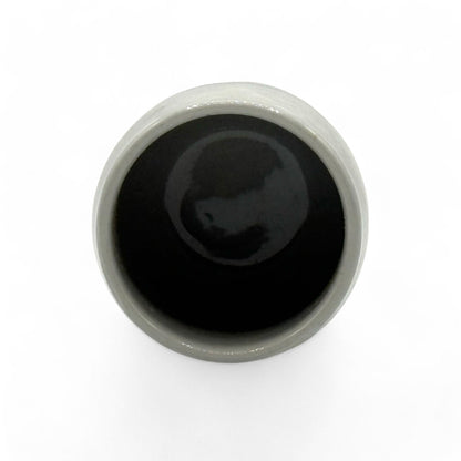 Handcrafted Mino-yaki Yunomi Japanese teacup with traditional glaze, perfect for daily tea rituals.