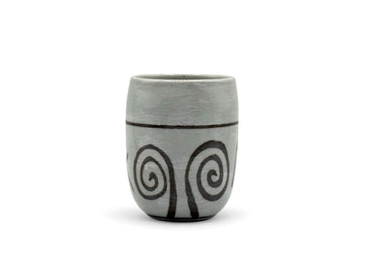 Handcrafted Mino-yaki Yunomi Japanese teacup with traditional glaze, perfect for daily tea rituals.